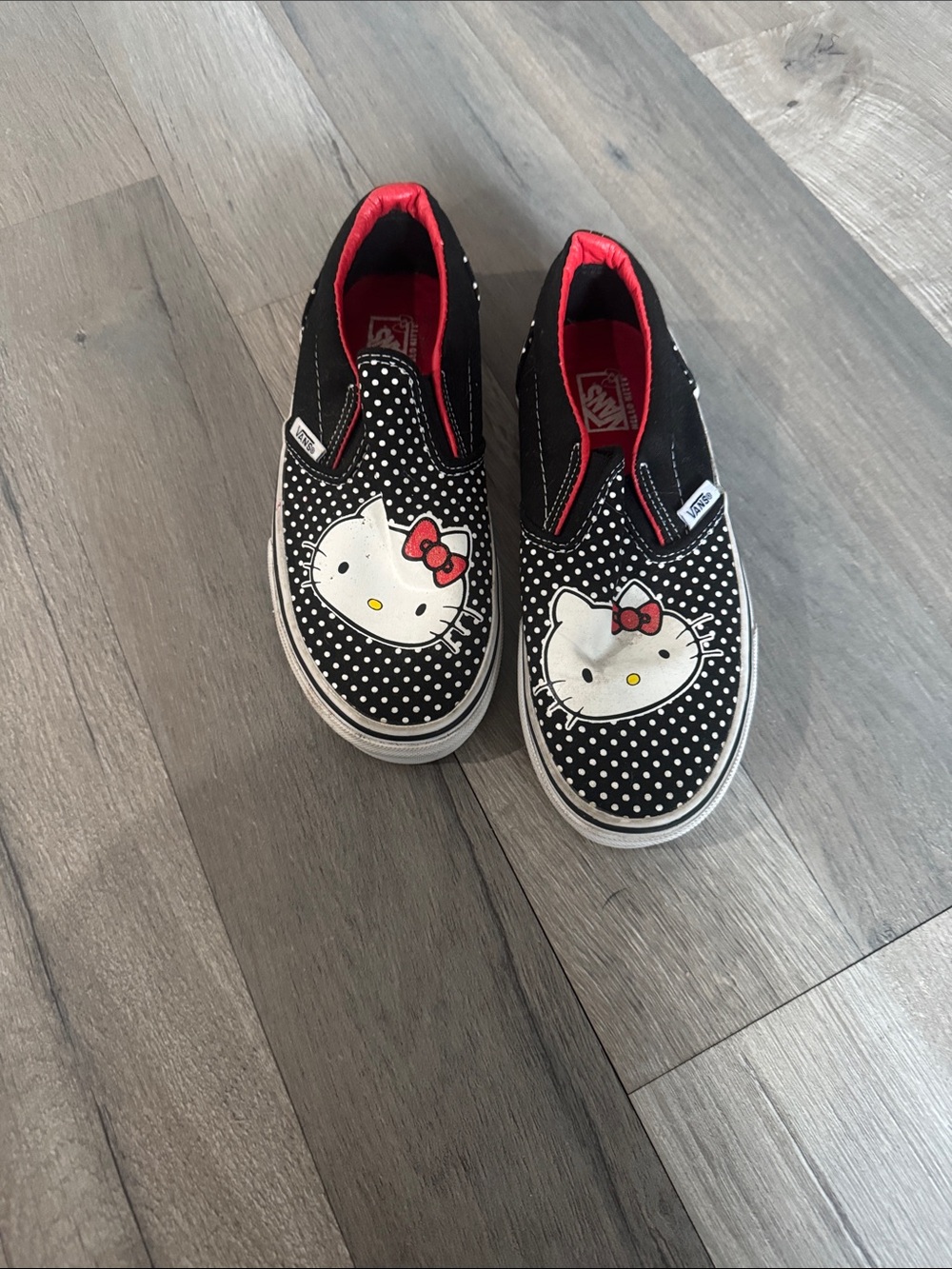 Vans Kids Slip-On Sneakers - Black, White & Red Hello Kitty Polka Dot | Kids- 2